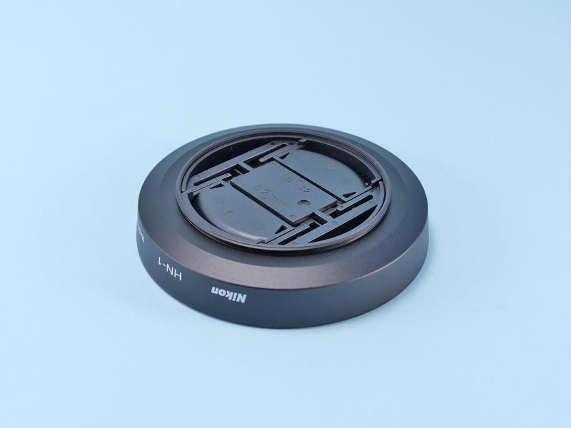 06
ニコン ねじ込みフード HN-1
LC-52キャップ、裏